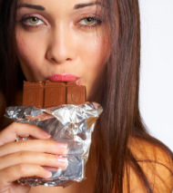 woman indulging in chocolate