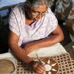 woman from Sri Lanka creating batik